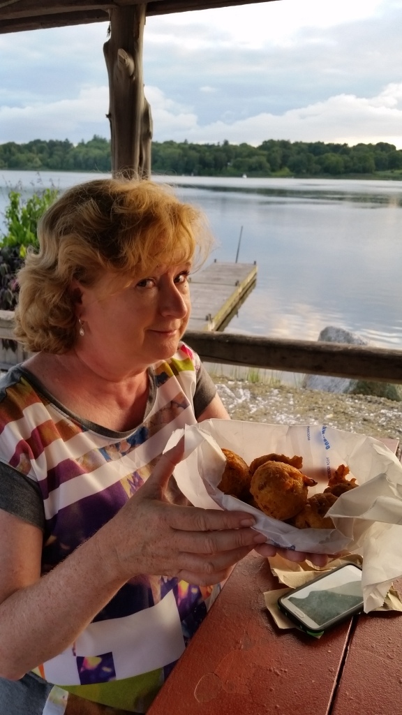 Carol presents the final clam cake of the crawl: Evelyn's Drive-In